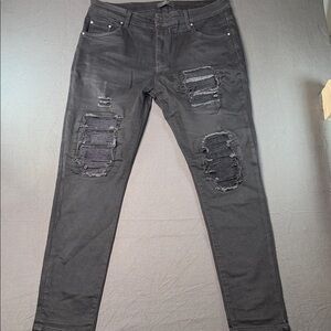 AMIRI Black Distressed Skinny Jeans